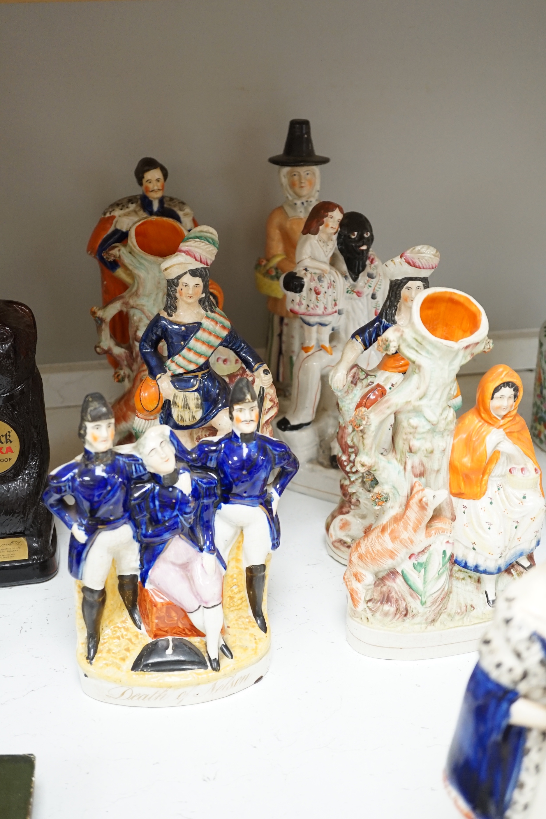 Eleven Staffordshire flatback figures